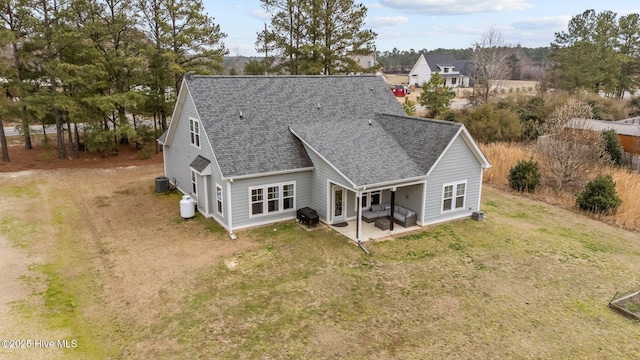 264 Bibey Rd, Carthage, NC 28327 - rear view of house featuring roof with shingles, central air condition unit, a patio, and a yard