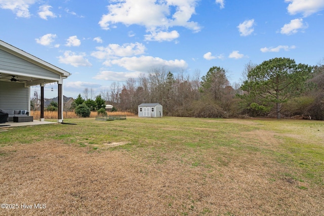264 Bibey Rd, Carthage, NC 28327 - view of green lawn featuring a ceiling fan, an outdoor hangout area, and a patio area