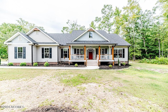 310 Willow Oak Ct, Cameron, NC 28326 - modern farmhouse with a porch, a front lawn, a shingled roof, and board and batten siding