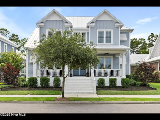 1012 Midnight Channel Rd, Wilmington, NC 28403 - view of front of home featuring a porch, ceiling fan, board and batten siding, and a standing seam roof