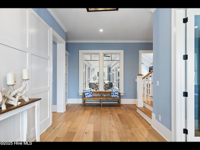 1012 Midnight Channel Rd, Wilmington, NC 28403 - hall featuring light wood-style flooring, crown molding, stairs, baseboards, and recessed lighting