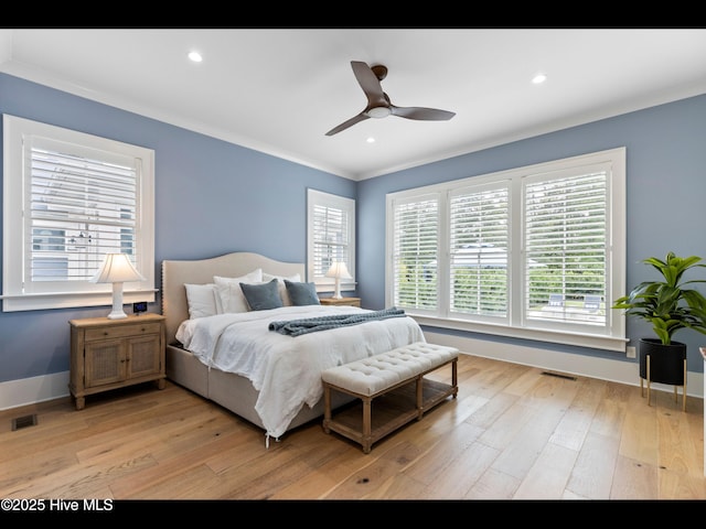 1012 Midnight Channel Rd, Wilmington, NC 28403 - bedroom featuring light wood finished floors, ornamental molding, recessed lighting, baseboards, and a ceiling fan