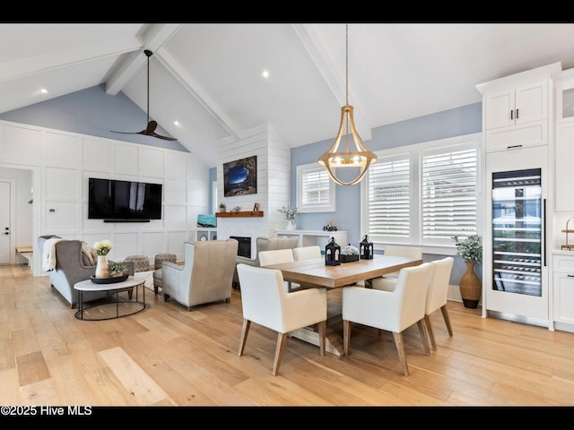 1012 Midnight Channel Rd, Wilmington, NC 28403 - dining room featuring beverage cooler, light wood-style flooring, ceiling fan, and recessed lighting