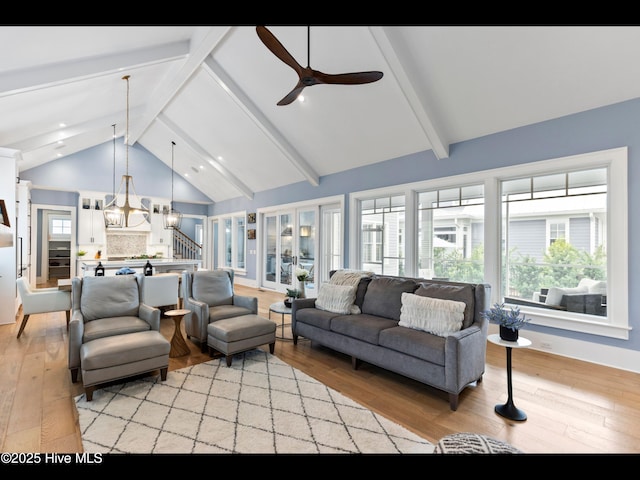 1012 Midnight Channel Rd, Wilmington, NC 28403 - living room with light wood-style flooring, a ceiling fan, and a chandelier