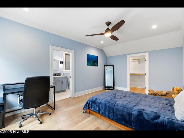 1012 Midnight Channel Rd, Wilmington, NC 28403 - bedroom featuring light wood-type flooring, vaulted ceiling, recessed lighting, baseboards, and a desk