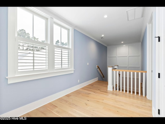 1012 Midnight Channel Rd, Wilmington, NC 28403 - unfurnished room featuring wood finished floors, crown molding, baseboards, and recessed lighting