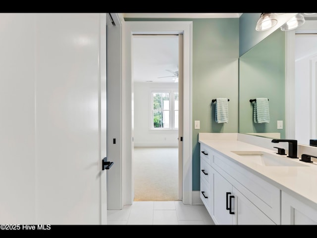 1012 Midnight Channel Rd, Wilmington, NC 28403 - bathroom featuring vanity, ceiling fan, tile patterned floors, and baseboards