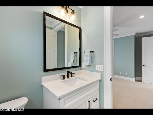 1012 Midnight Channel Rd, Wilmington, NC 28403 - half bath featuring crown molding, vanity, toilet, and recessed lighting
