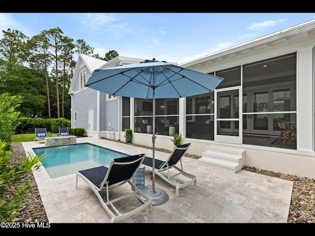 1012 Midnight Channel Rd, Wilmington, NC 28403 - swimming pool featuring a sunroom and a patio