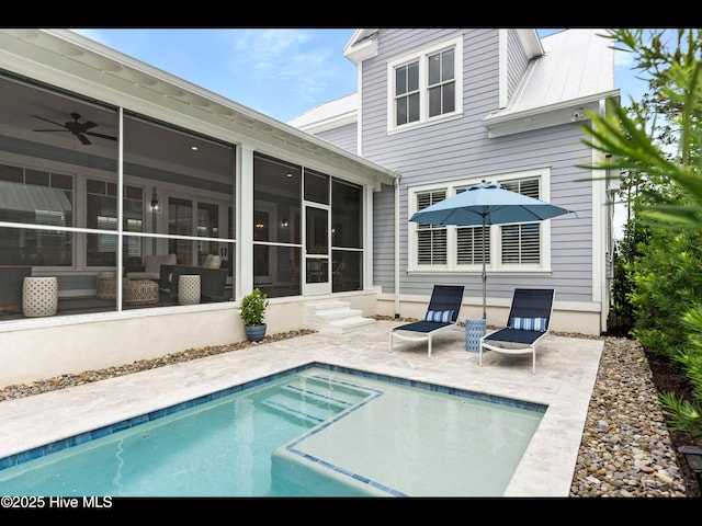 1012 Midnight Channel Rd, Wilmington, NC 28403 - rear view of house featuring a sunroom, a patio, an outdoor pool, and entry steps