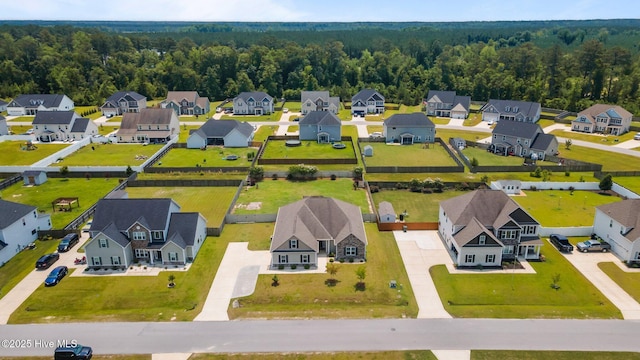 1006 Kingfish Way, New Bern, NC 28562 - aerial perspective of suburban area featuring a forest