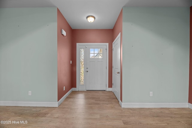 1006 Kingfish Way, New Bern, NC 28562 - foyer entrance featuring light wood-type flooring and baseboards