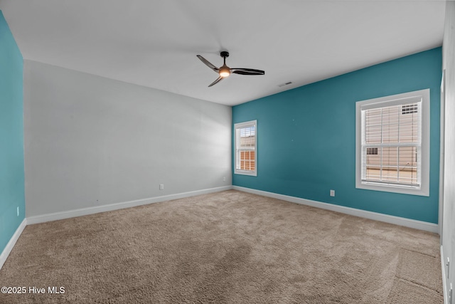 1006 Kingfish Way, New Bern, NC 28562 - empty room with a ceiling fan, carpet, and baseboards