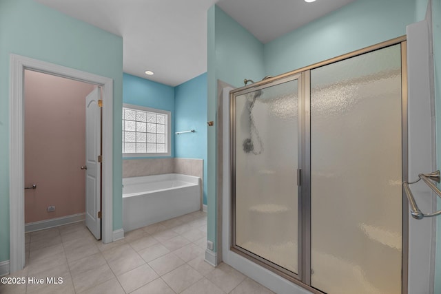 1006 Kingfish Way, New Bern, NC 28562 - bathroom featuring a shower stall, a garden tub, tile patterned floors, and baseboards