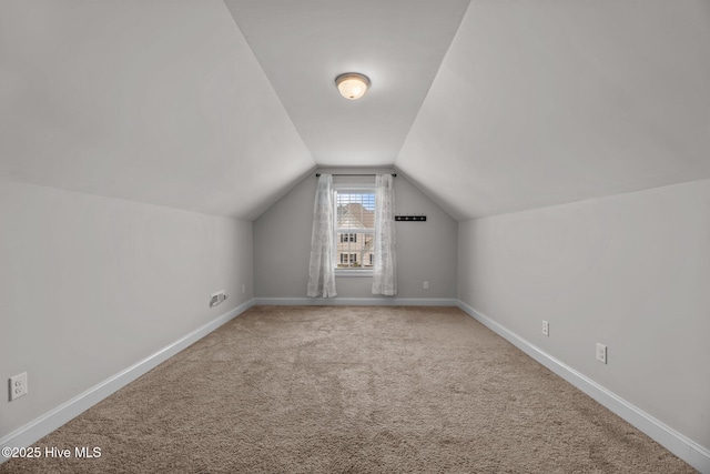 1006 Kingfish Way, New Bern, NC 28562 - additional living space with lofted ceiling, carpet flooring, and baseboards