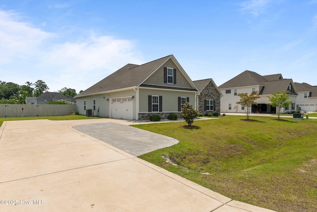 1006 Kingfish Way, New Bern, NC 28562 - craftsman inspired home with stone siding, concrete driveway, and central AC