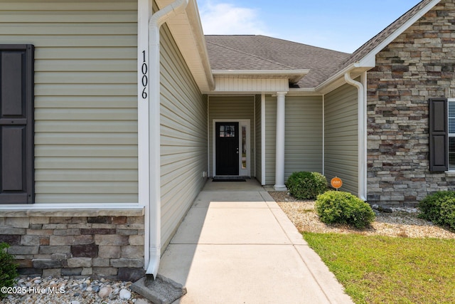 1006 Kingfish Way, New Bern, NC 28562 - doorway to property featuring roof with shingles and stone siding