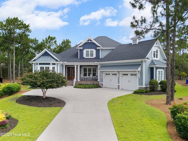 2570 Sugar Maple Ct, Southport, NC 28461 - view of front facade featuring roof with shingles, a front yard, and driveway