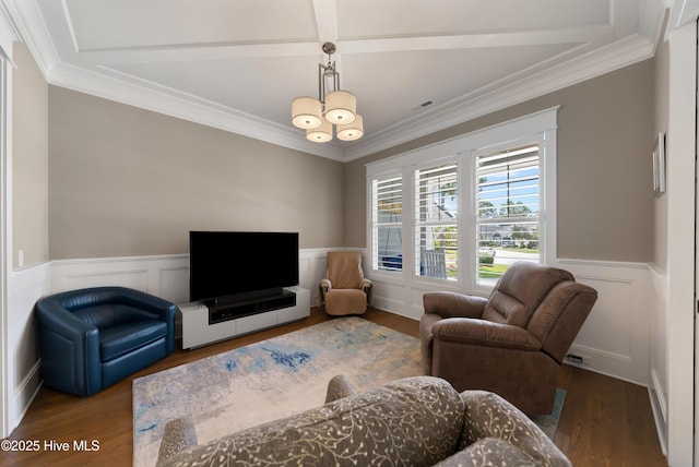 2570 Sugar Maple Ct, Southport, NC 28461 - living room with wood finished floors, wainscoting, crown molding, and a decorative wall