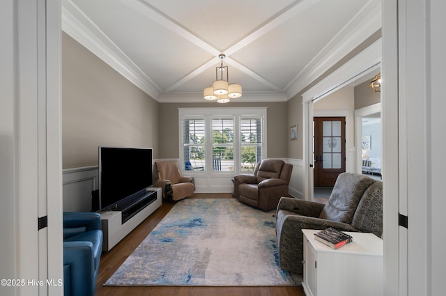 2570 Sugar Maple Ct, Southport, NC 28461 - living room with wainscoting, dark wood-style flooring, french doors, ornamental molding, and a decorative wall