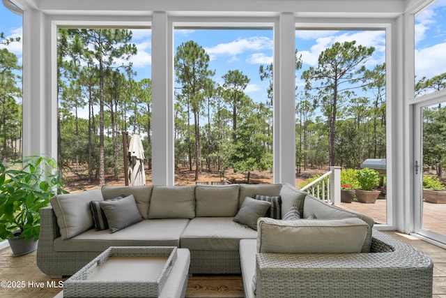 2570 Sugar Maple Ct, Southport, NC 28461 - sunroom featuring plenty of natural light and view of wooded area