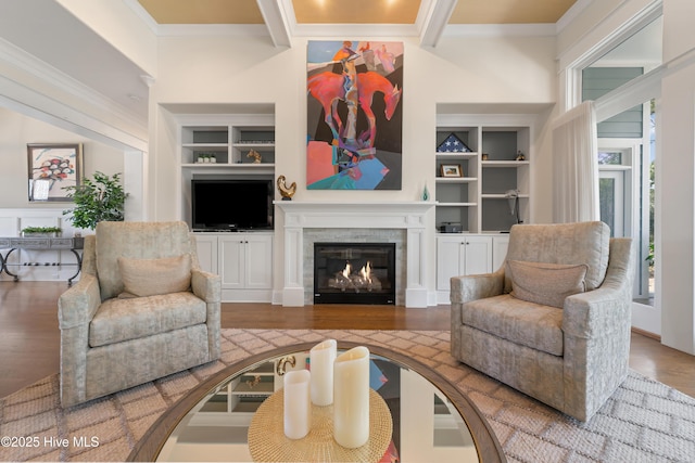2570 Sugar Maple Ct, Southport, NC 28461 - living room with plenty of natural light, wood finished floors, built in features, ornamental molding, and beamed ceiling