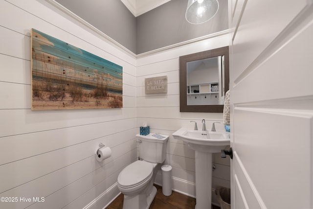 2570 Sugar Maple Ct, Southport, NC 28461 - bathroom featuring wood finished floors, ornamental molding, and wood walls