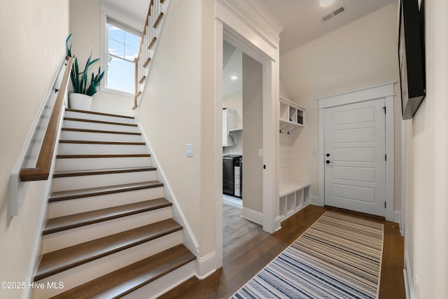 2570 Sugar Maple Ct, Southport, NC 28461 - mudroom with dark wood finished floors and baseboards