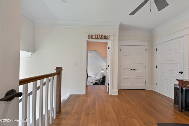2570 Sugar Maple Ct, Southport, NC 28461 - hallway with wood finished floors, ornamental molding, and an upstairs landing
