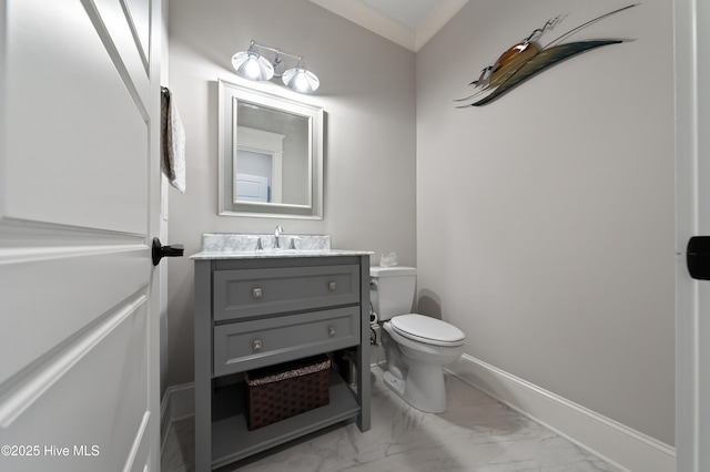 2570 Sugar Maple Ct, Southport, NC 28461 - bathroom with marble look tile flooring, vanity, and ornamental molding
