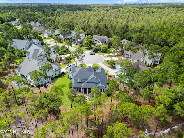 2570 Sugar Maple Ct, Southport, NC 28461 - aerial view of residential area featuring a heavily wooded area