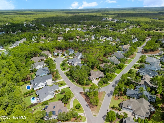 2570 Sugar Maple Ct, Southport, NC 28461 - aerial perspective of suburban area with a forest