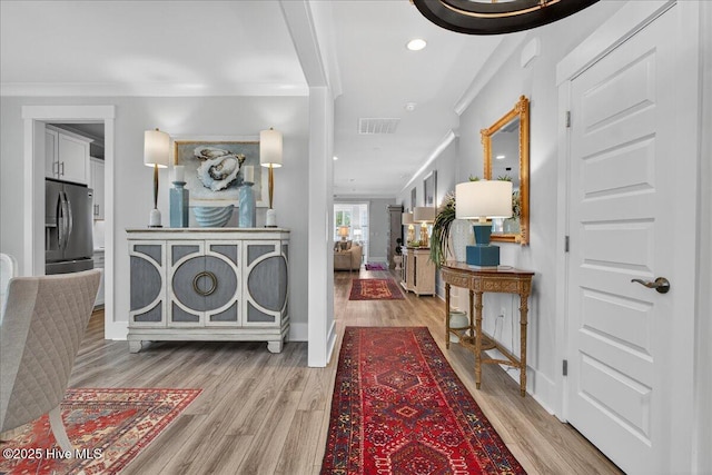 9294 Murphy Way SW, Calabash, NC 28467 - corridor with ornamental molding, light wood-style floors, baseboards, and recessed lighting