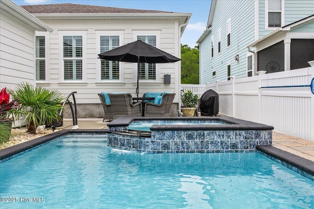 9294 Murphy Way SW, Calabash, NC 28467 - view of swimming pool with a pool with connected hot tub, a grill, and a patio