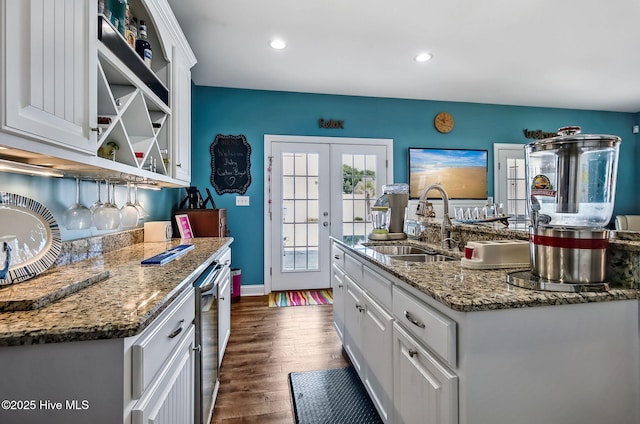 2911 Ridge Rd NW, Wilson, NC 27896 - kitchen featuring a sink, white cabinetry, french doors, dark wood-type flooring, and recessed lighting