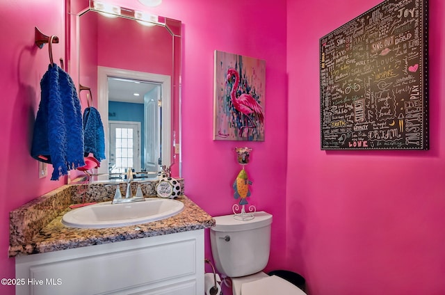 2911 Ridge Rd NW, Wilson, NC 27896 - half bathroom with toilet and vanity