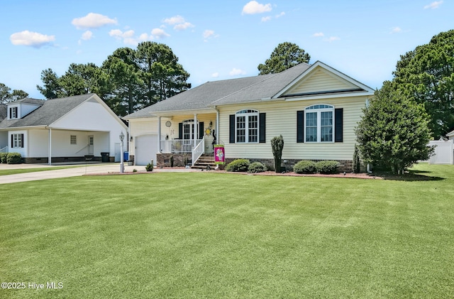 2911 Ridge Rd NW, Wilson, NC 27896 - view of front facade featuring a front lawn, an attached garage, covered porch, driveway, and a shingled roof