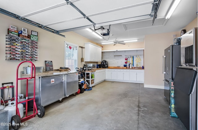 2911 Ridge Rd NW, Wilson, NC 27896 - garage with a workshop area and a garage door opener
