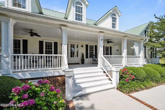 103 Low Country Ct, Hampstead, NC 28443 - doorway to property featuring a ceiling fan, covered porch, and metal roof