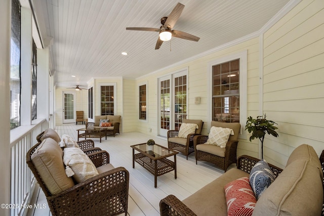 103 Low Country Ct, Hampstead, NC 28443 - sunroom with ceiling fan and an outdoor living space