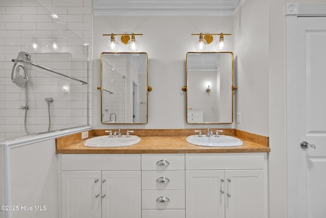 103 Low Country Ct, Hampstead, NC 28443 - full bath with ornamental molding, double vanity, and a tile shower