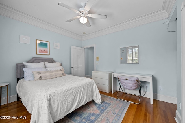 103 Low Country Ct, Hampstead, NC 28443 - bedroom featuring crown molding, wood finished floors, baseboards, and a ceiling fan