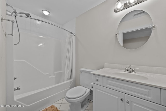 103 Low Country Ct, Hampstead, NC 28443 - full bath featuring vanity, tile patterned floors, shower / tub combo with curtain, and toilet