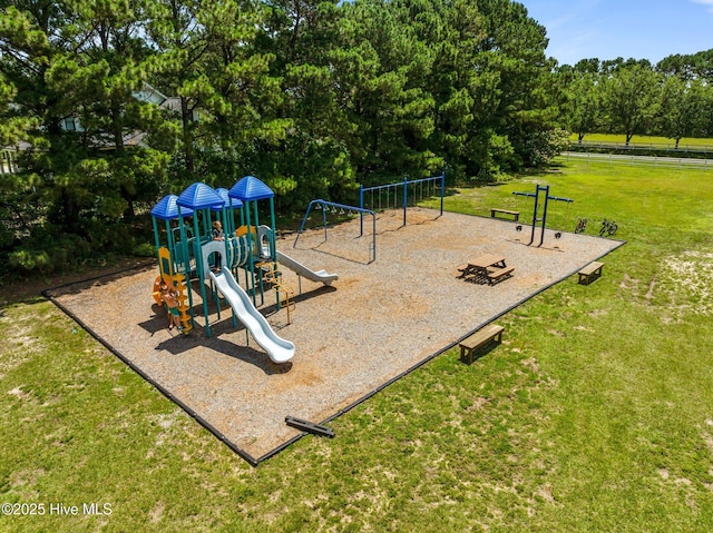 103 Low Country Ct, Hampstead, NC 28443 - community playground with a yard and view of wooded area