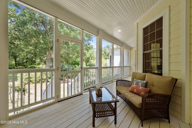 103 Low Country Ct, Hampstead, NC 28443 - sunroom with wooden ceiling, plenty of natural light, and an outdoor hangout area