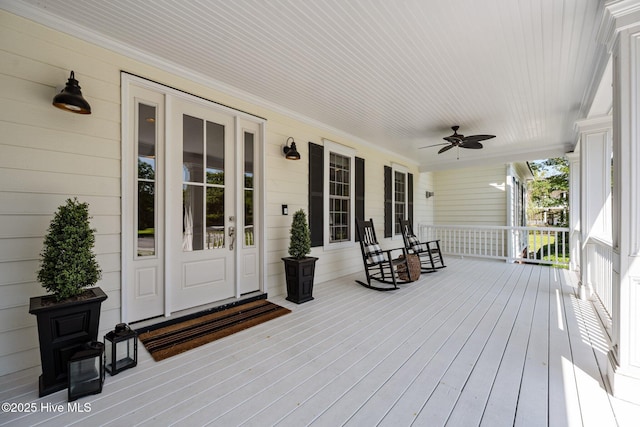 103 Low Country Ct, Hampstead, NC 28443 - wooden porch featuring a ceiling fan