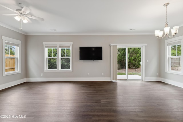 749 Cypress Village Pl, Wilmington, NC 28412 - spare room with dark wood-type flooring, crown molding, a chandelier, baseboards, and a ceiling fan