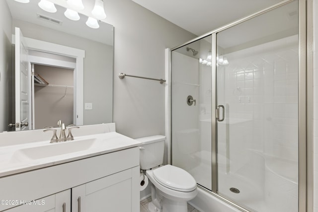 749 Cypress Village Pl, Wilmington, NC 28412 - full bath with a shower stall, vanity, toilet, and a spacious closet