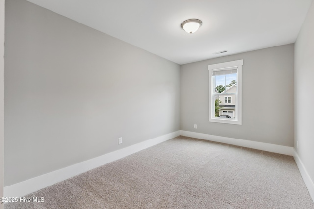 749 Cypress Village Pl, Wilmington, NC 28412 - carpeted empty room featuring baseboards