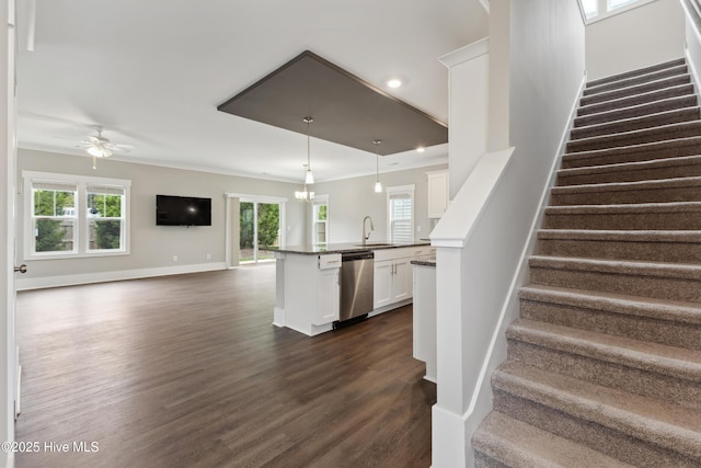 749 Cypress Village Pl, Wilmington, NC 28412 - stairway featuring wood finished floors, healthy amount of natural light, ceiling fan, baseboards, and recessed lighting